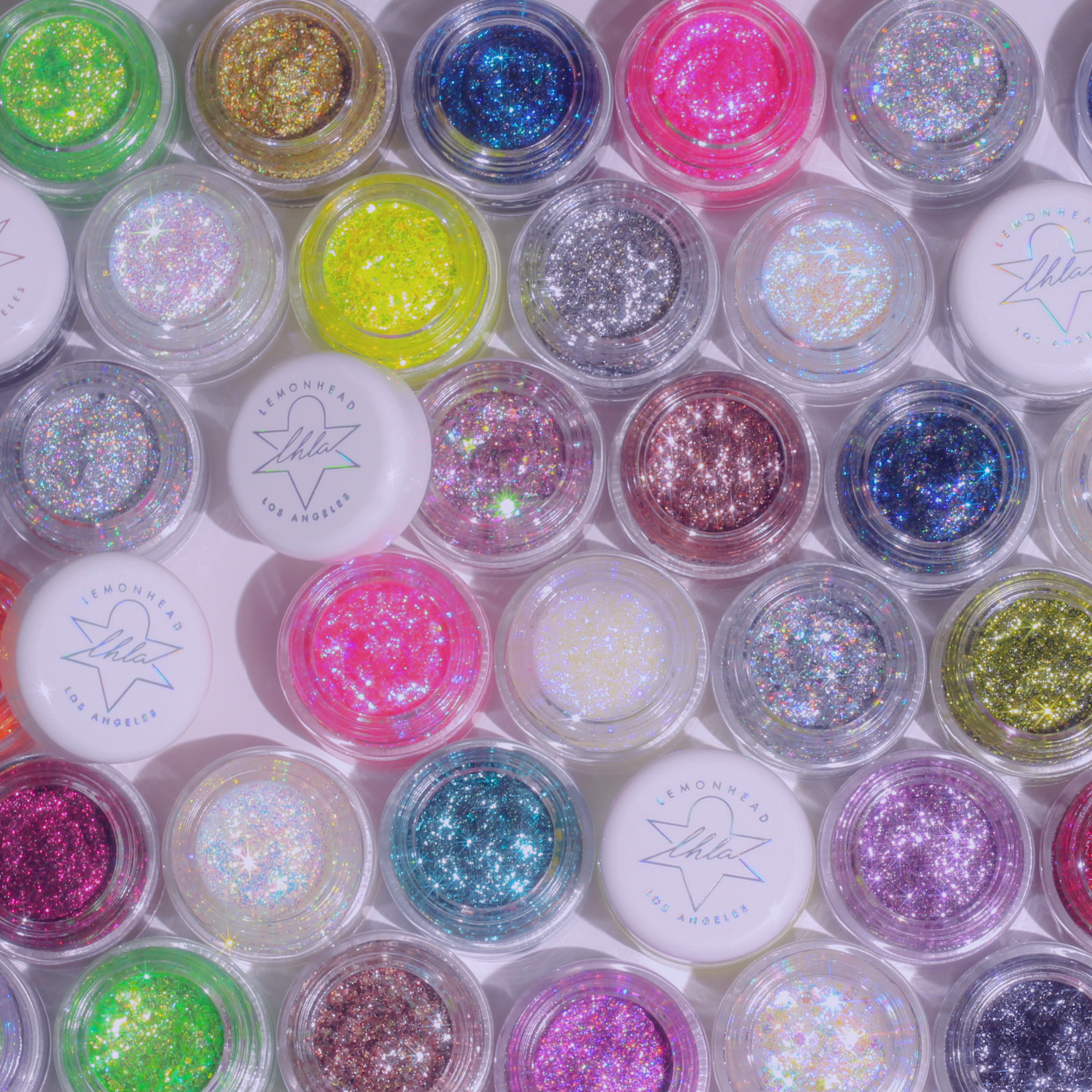assortment of lemonhead la glitter jars