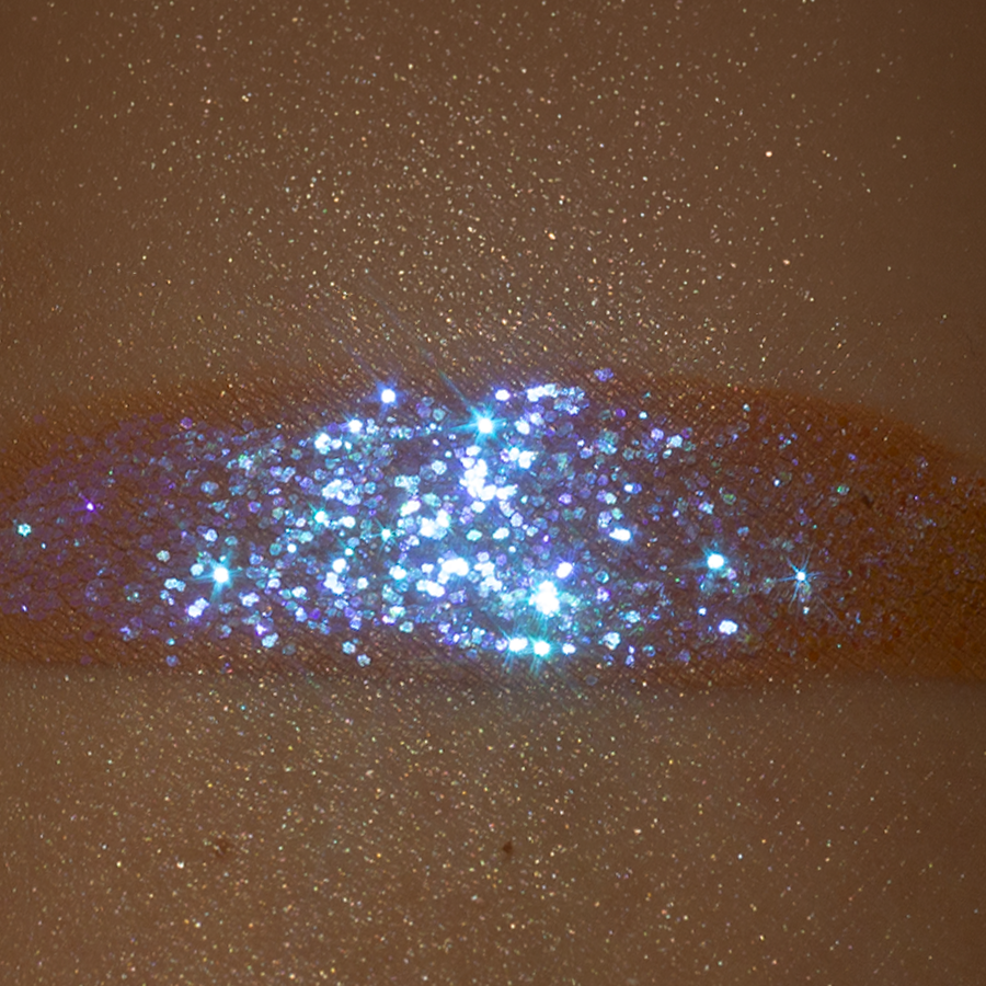 glitter swatch on arm with forplay spray
